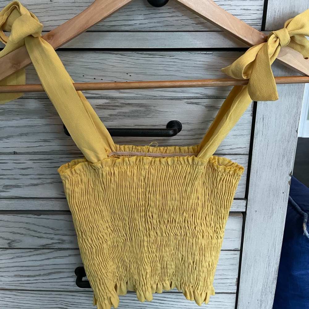 Yellow smocked crop with tie closure